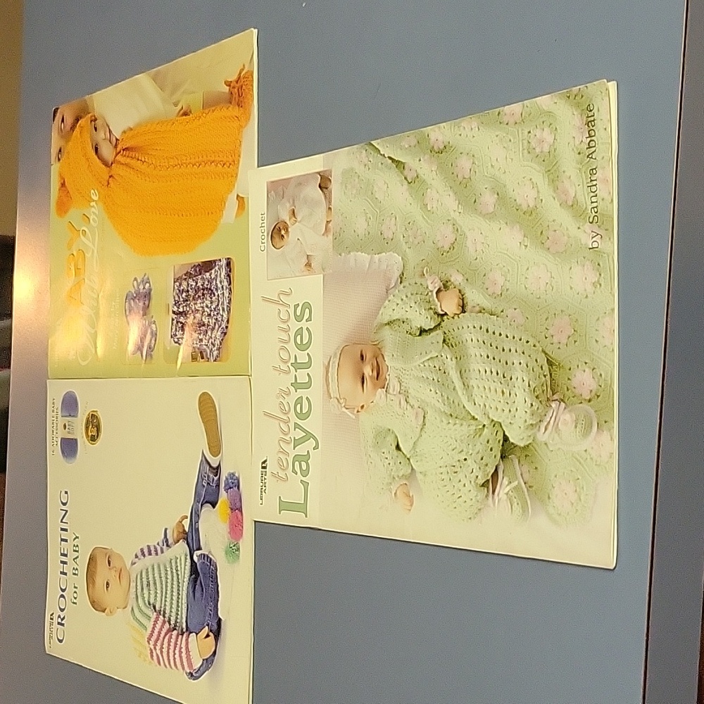 Three crocheting books .